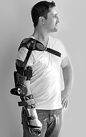 Young man wearing a Myopro on right arm.